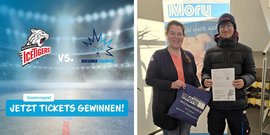 Im Hintergrund ist ein Werbebanner zu sehen, während die Frau und der Mann lächeln und stolz auf ihre Geschenke sind.